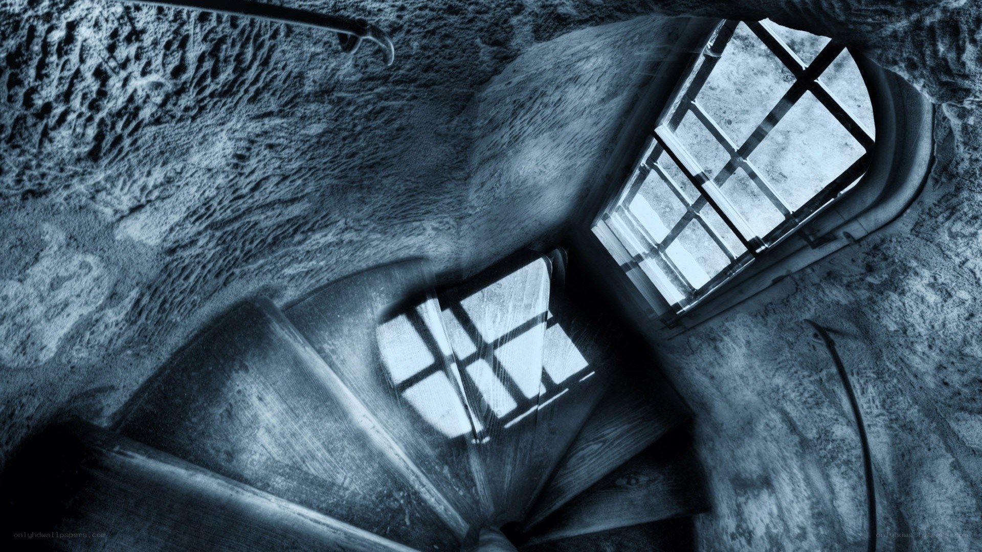 spiral staircase with barred window