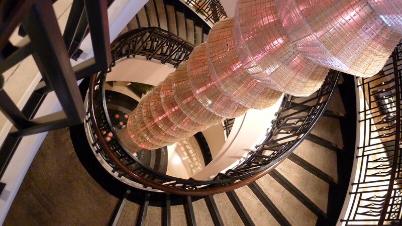 Spiral staircase with chandelier