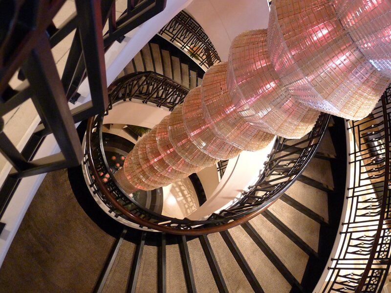 Spiral staircase with chandelier