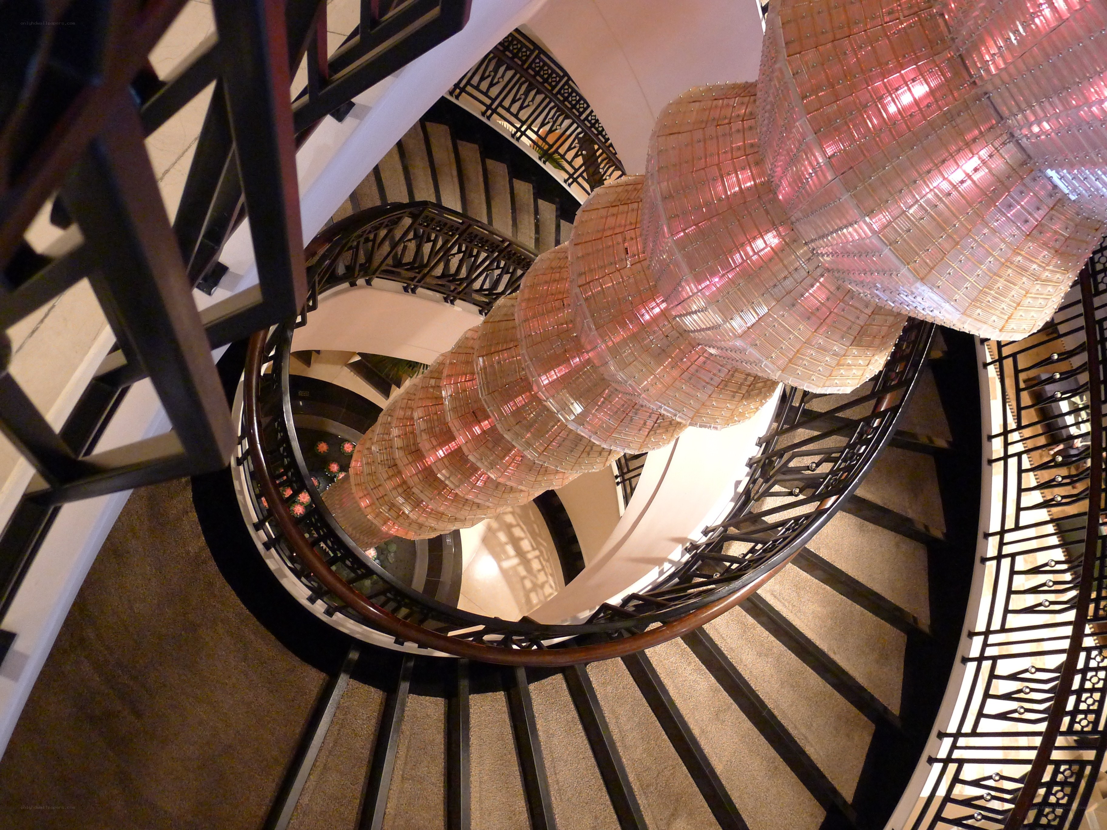 Spiral staircase with chandelier