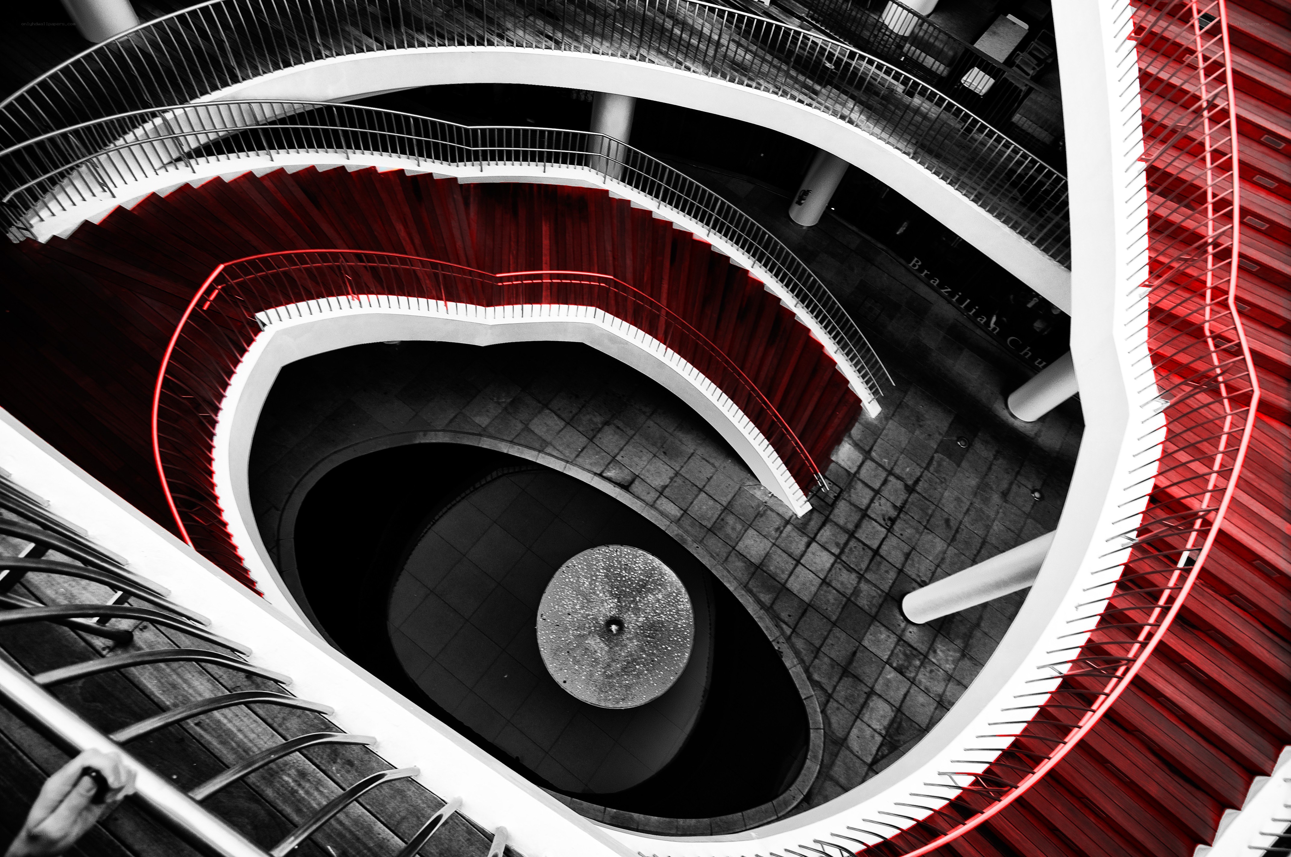 spiral staircase with red accents