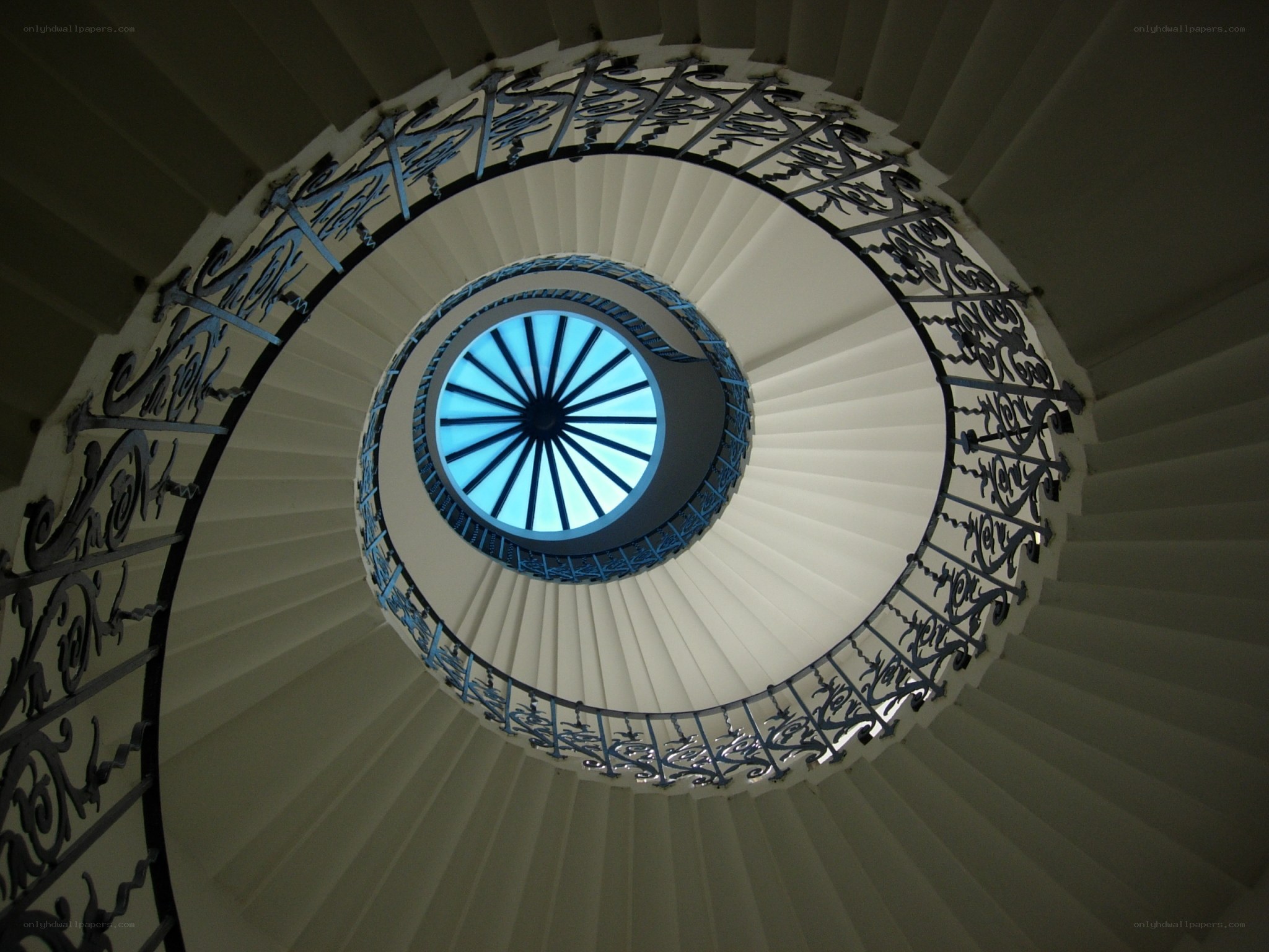 spiral staircase with skylight