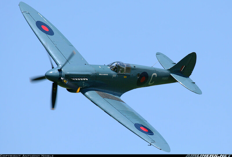 Spitfire Fighter Plane — Blue, Calm, Afternoon, Photograph