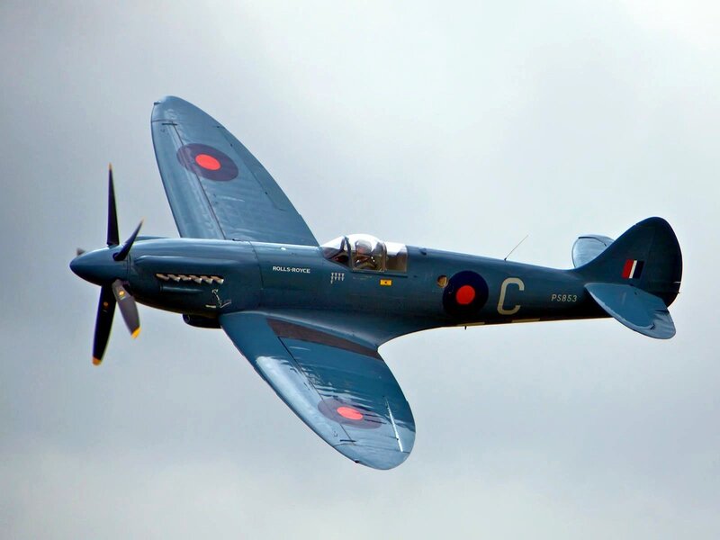 Spitfire Fighter Plane — Blue, Dynamic, Photograph