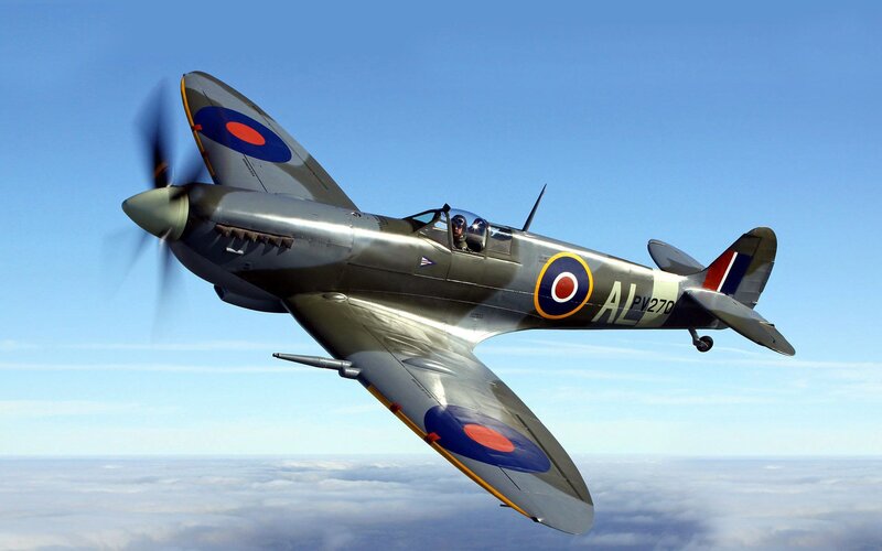 Spitfire Fighter Plane — Blue, Serene, Afternoon, Photograph