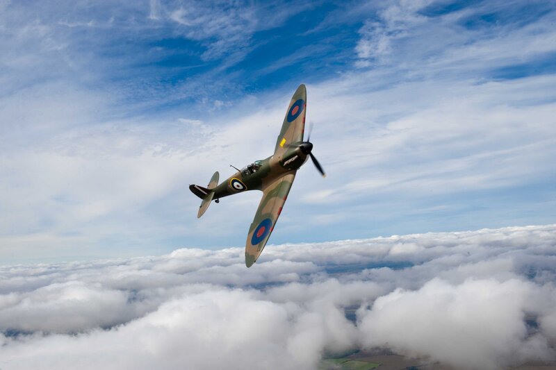 Spitfire Fighter Plane — Blue, Serene, Afternoon