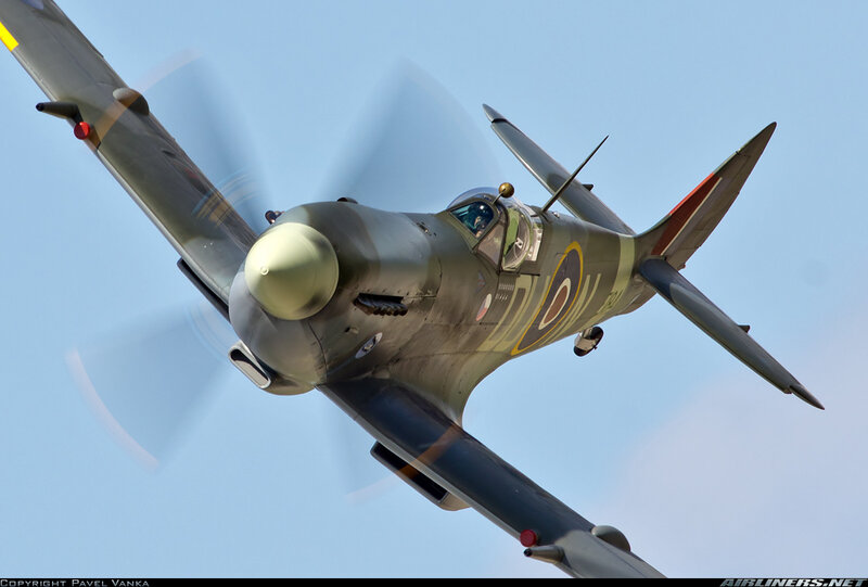 Spitfire Fighter Plane — Gray, Dynamic, Afternoon, Photograph, Propeller, Pilot