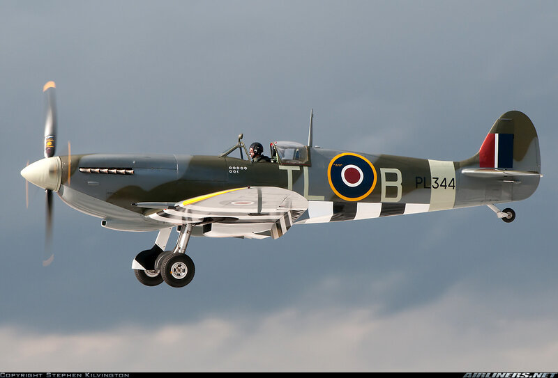 Spitfire Fighter Plane — Gray, Dynamic, Photograph, Pilot