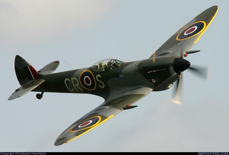 Spitfire Fighter Plane — Green, Dynamic, Afternoon, Photograph, Propeller