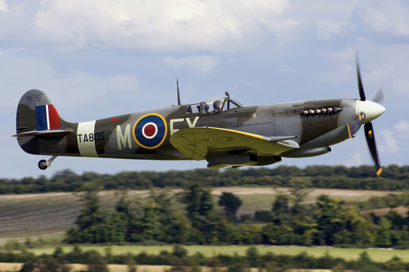Spitfire Fighter Plane — Green, Dynamic, Afternoon, Photograph