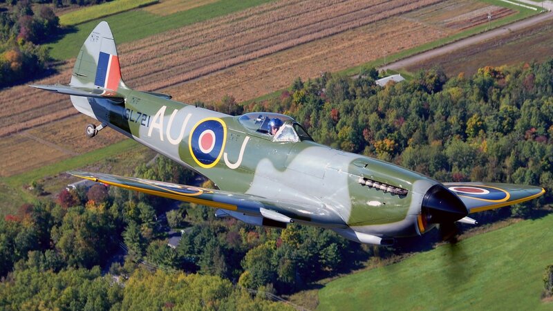 Spitfire Fighter Plane — Green, Dynamic, Autumn, Photograph