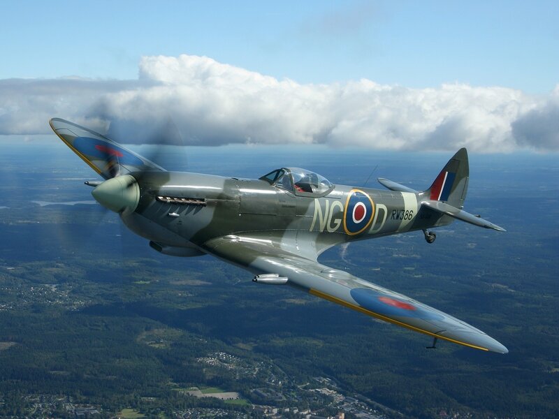 Spitfire Fighter Plane — Green, Serene, Afternoon, Photograph, Aircraft, Clouds