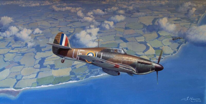 Spitfire in flight over coast