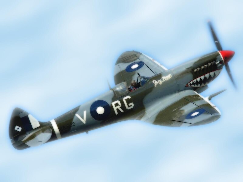 Spitfire in flight with shark teeth