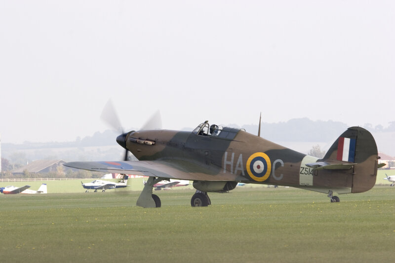 Spitfire on a grass airfield