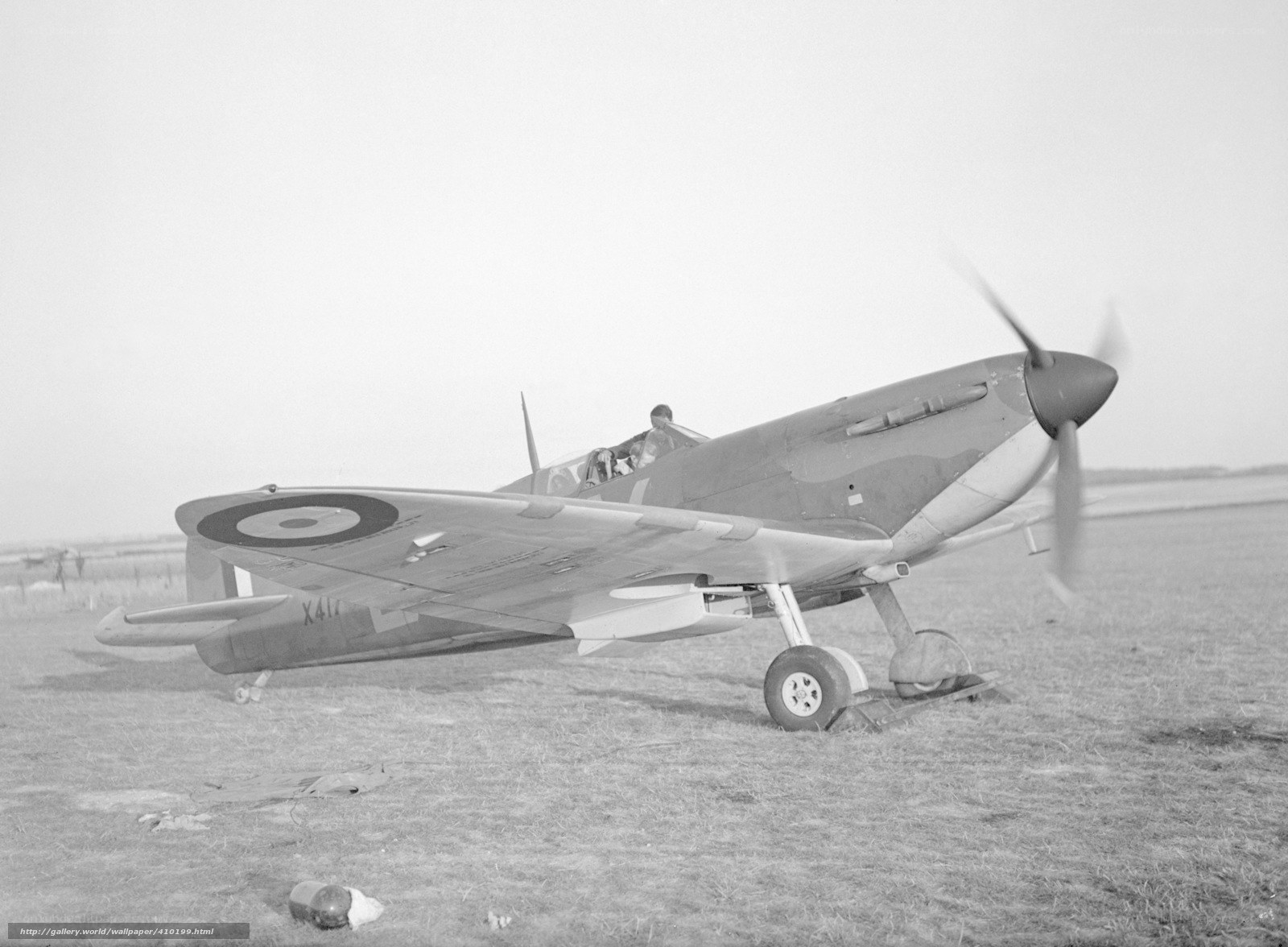 Spitfire on a grass airfield