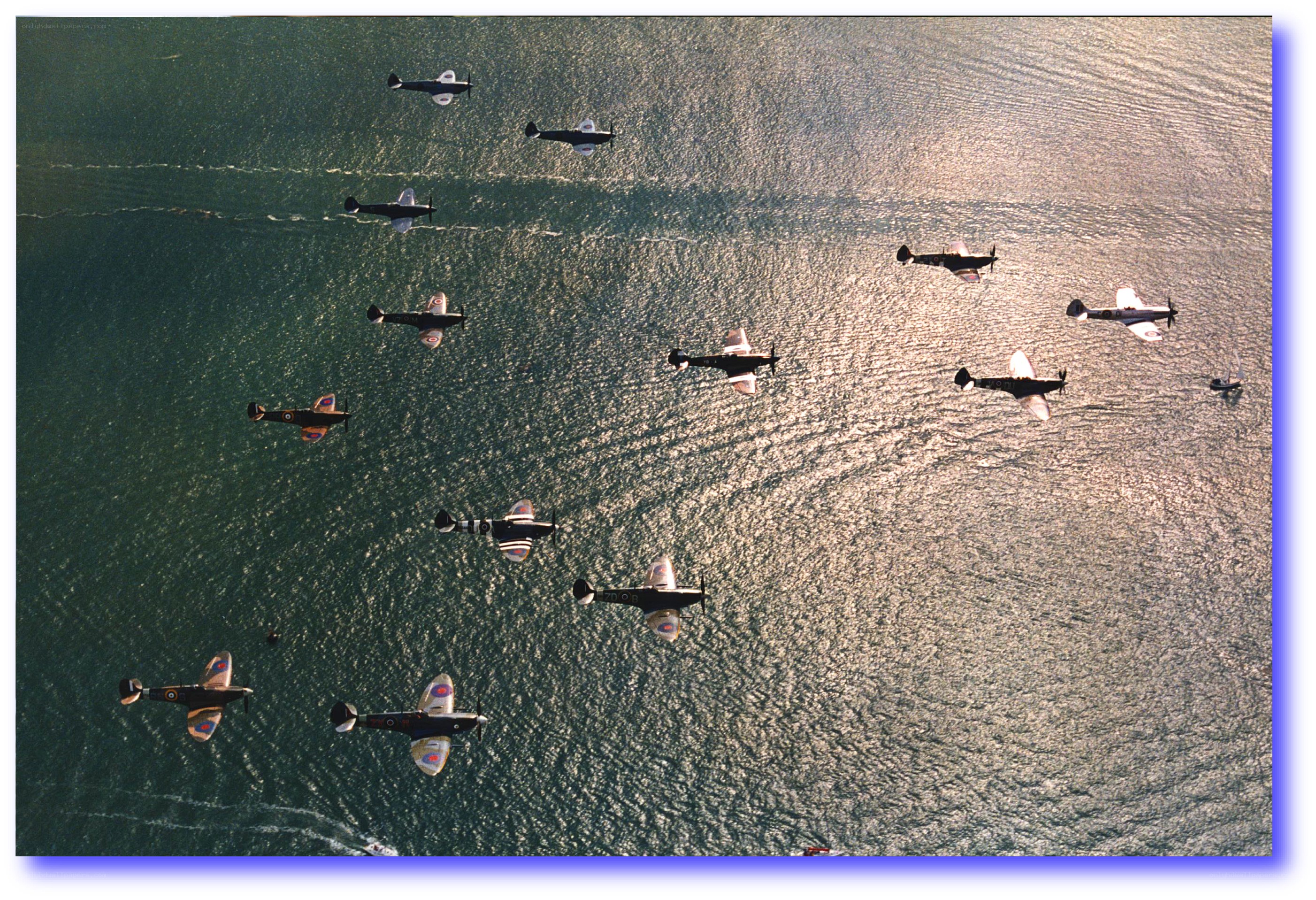 Spitfire planes over water