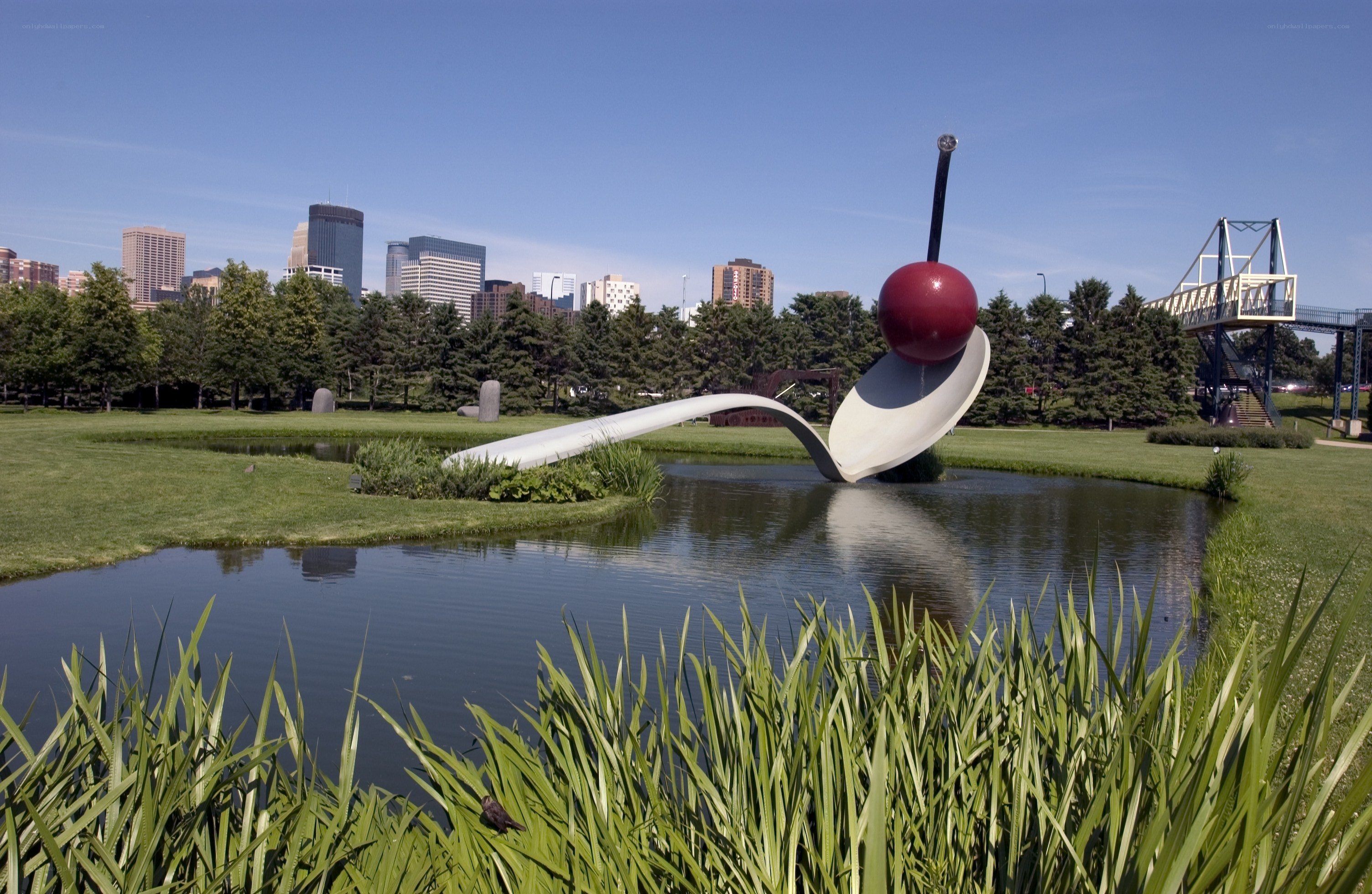 Spoon and cherry sculpture in park