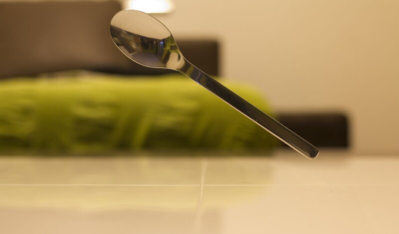 Spoon on a tiled surface