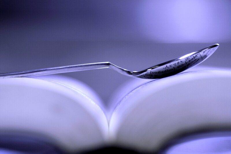 Spoon on Open Book