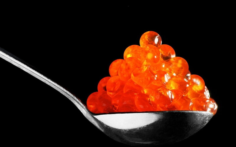 Spoon with red caviar