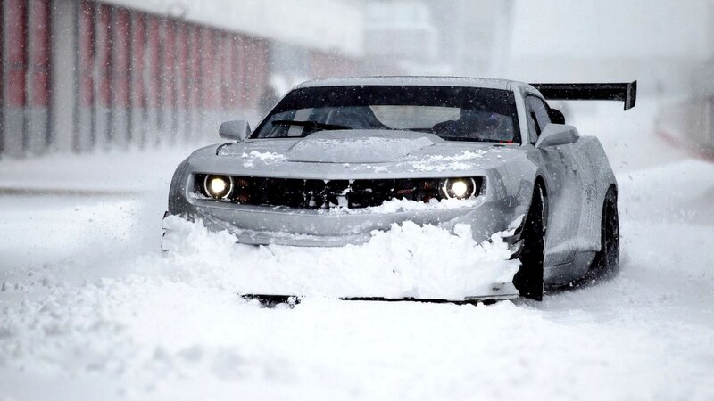 sports car in snowstorm