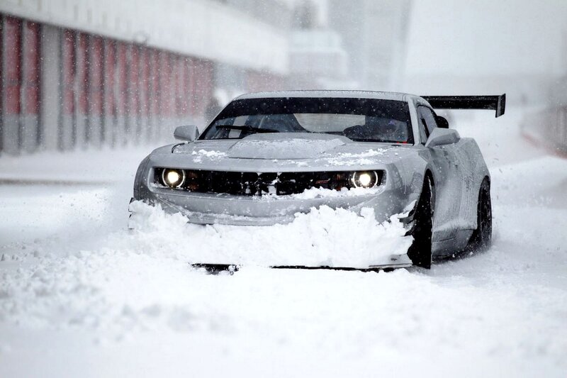 sports car in snowstorm
