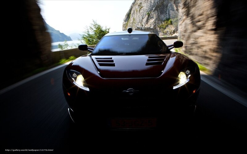 sports car on coastal road