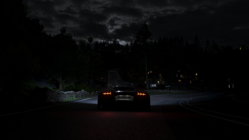 Sports Car on Road — Black, Dark, Quiet