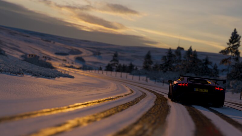 Sports Car on Snowy Road — White
