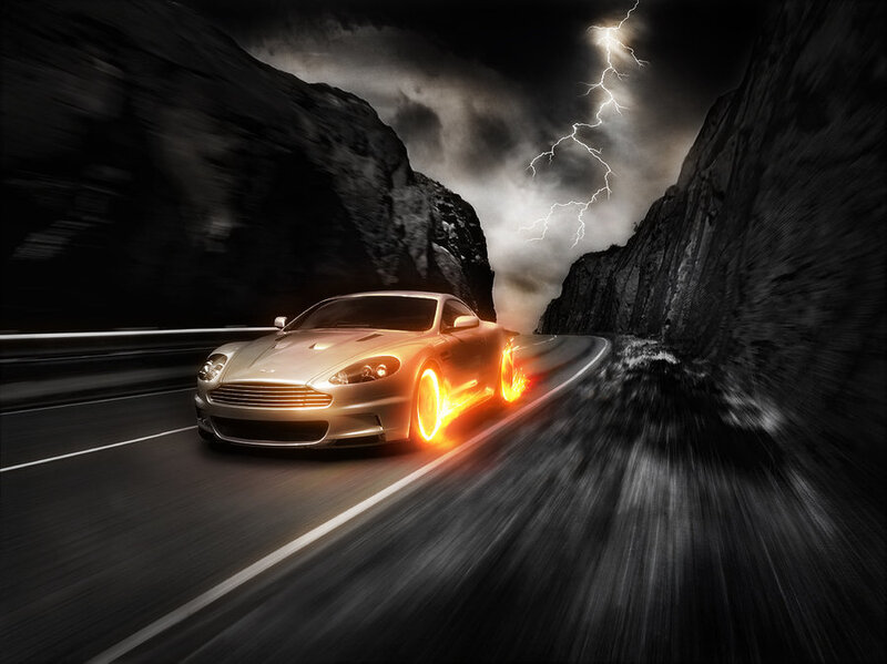 sports car on stormy mountain road
