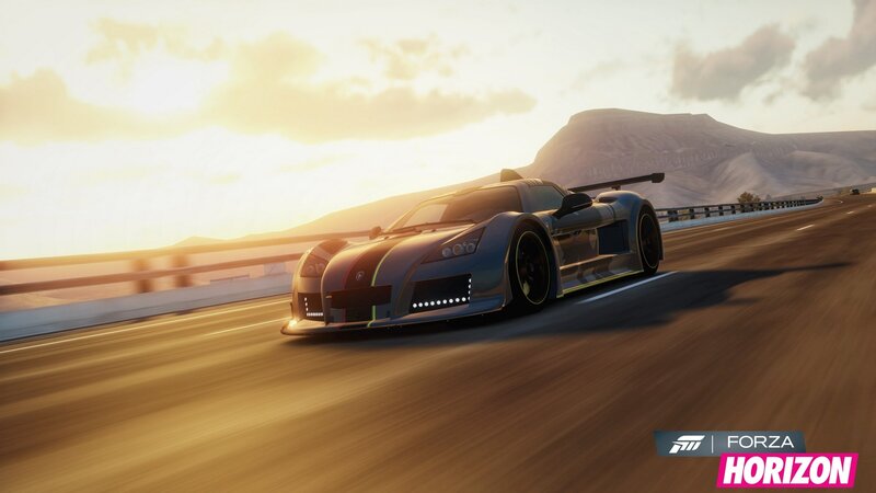 sports car racing at sunset