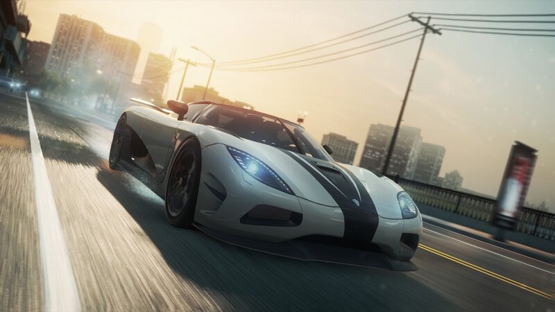 sports car racing on city bridge