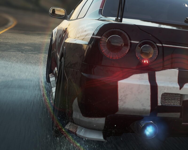 sports car racing on wet road