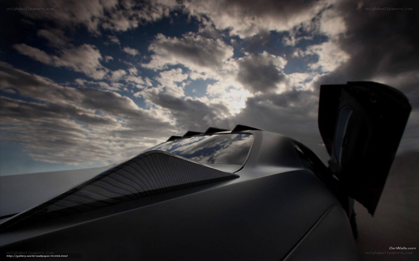 sports car under cloudy sky