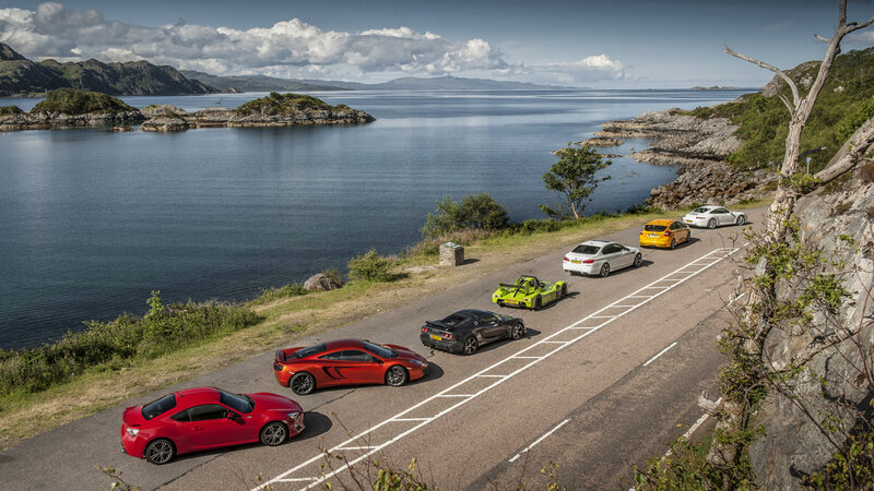 Sports Cars on Coastal Road — Red