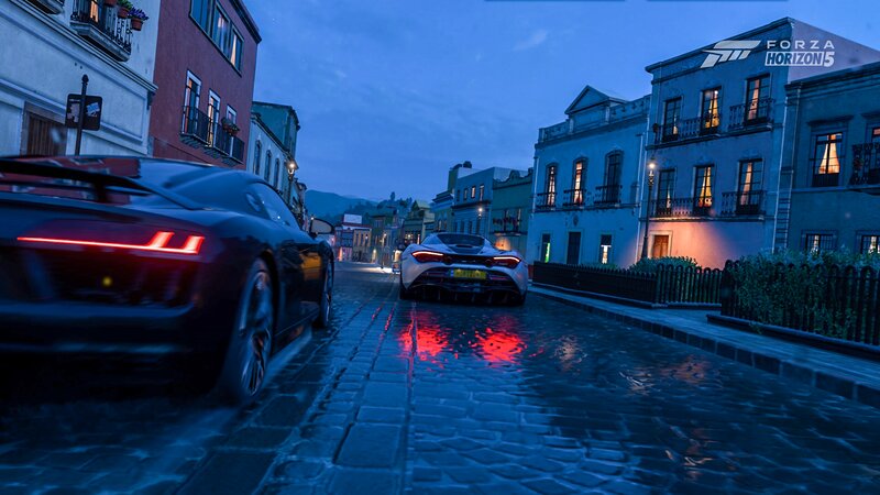 Sports Cars on Cobblestone Street