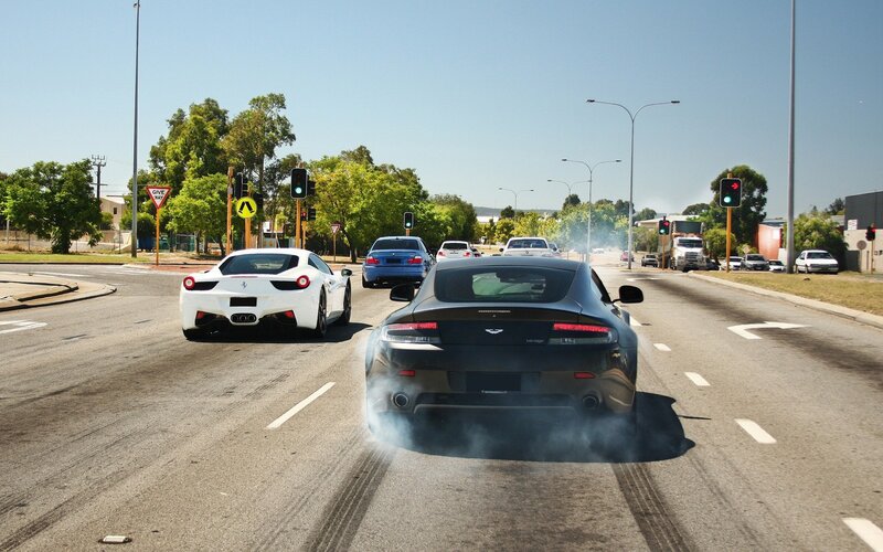 Sports Cars on Road — Black, Dramatic, Afternoon