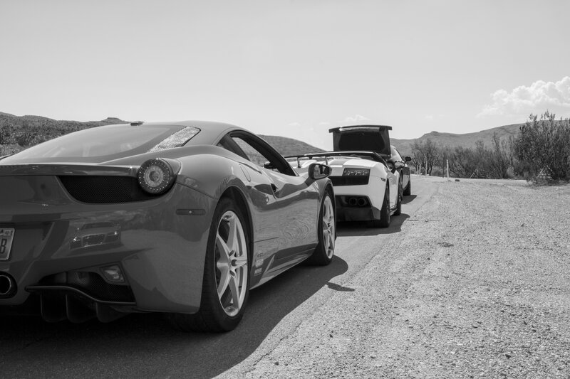 Sports Cars on Road — Black, Dramatic