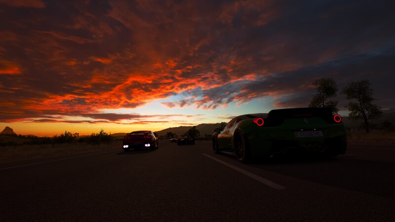 Sports Cars on Road — Orange, Dramatic