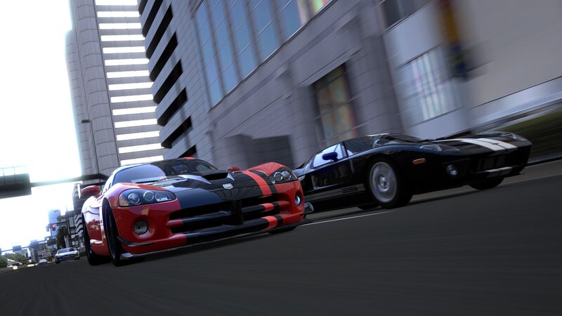 sports cars racing in city