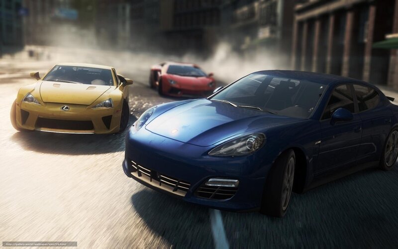 sports cars racing in city