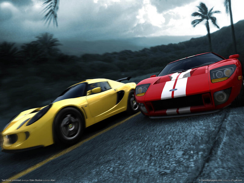 sports cars racing on a road