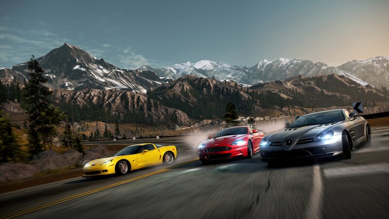 sports cars racing on mountain road