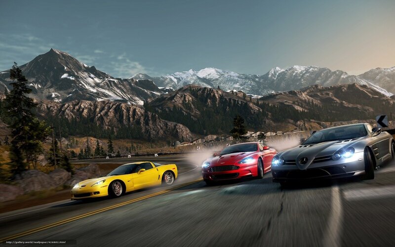 Sports cars racing on mountain road