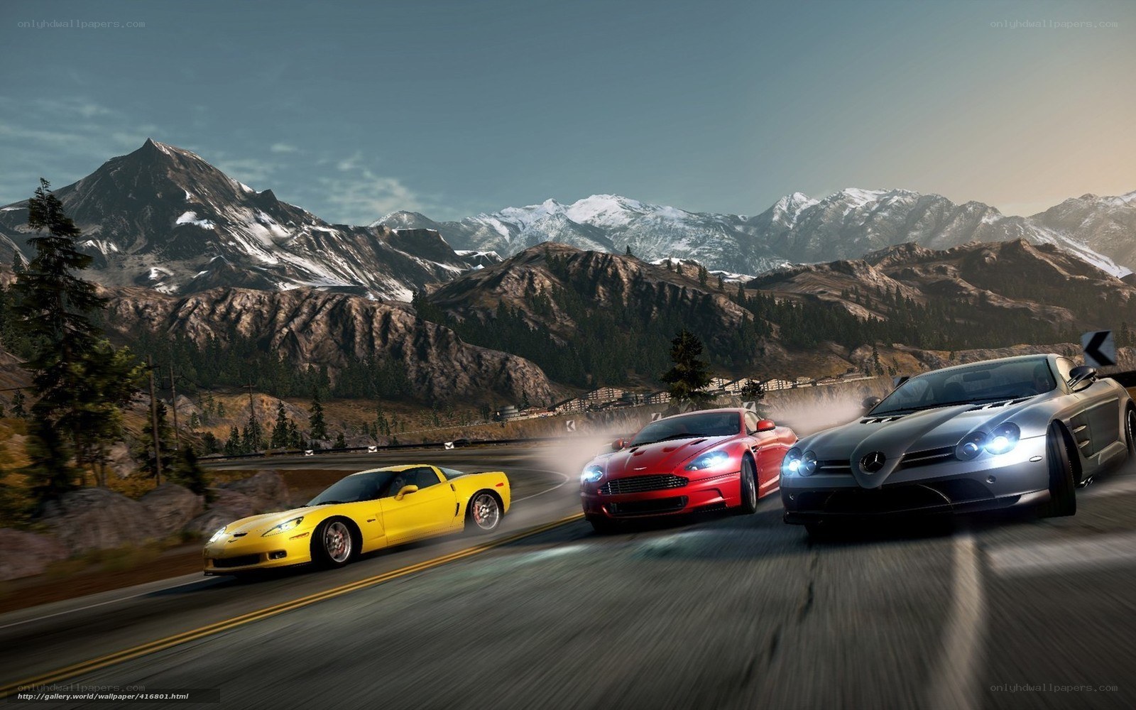 Sports cars racing on mountain road