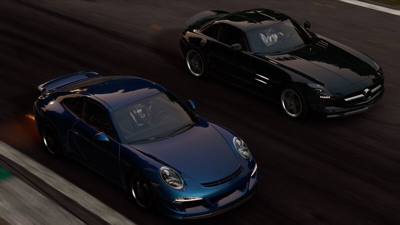 sports cars racing on track