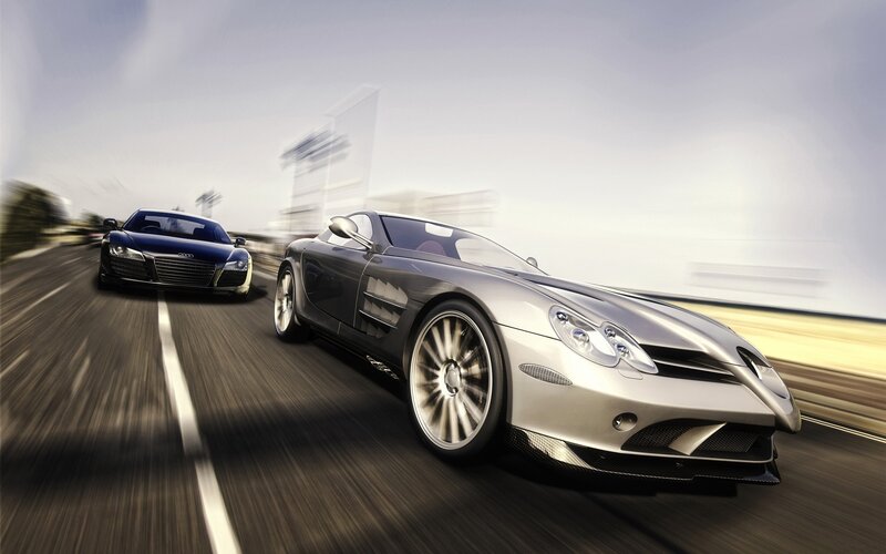 Sports cars racing on track