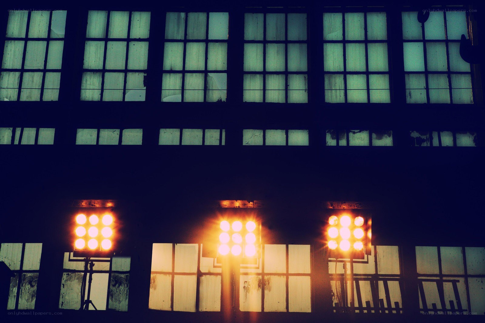 Spotlights in an old warehouse