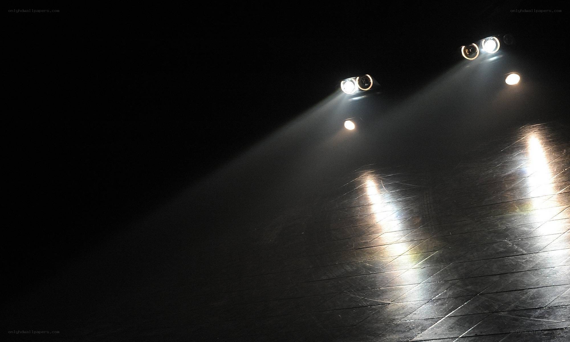 Spotlights on a dark stage